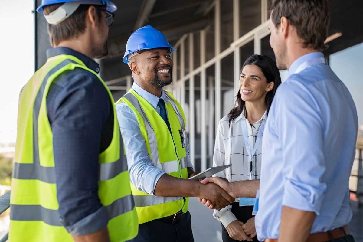 Group of construction workers talking